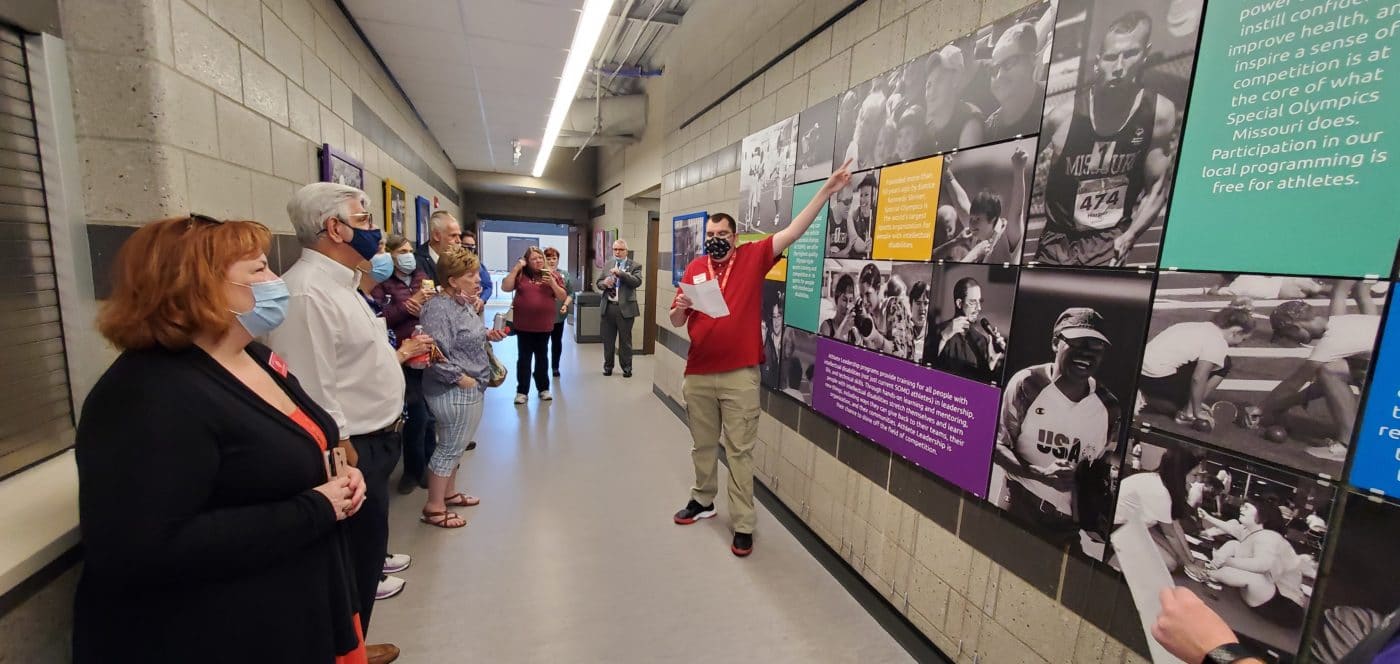 Training for Life Campus host Michael Mohrmann, right, leads part of the tour April 25 when some 120 Knights of Columbus members visited Special Olympics Missouri.