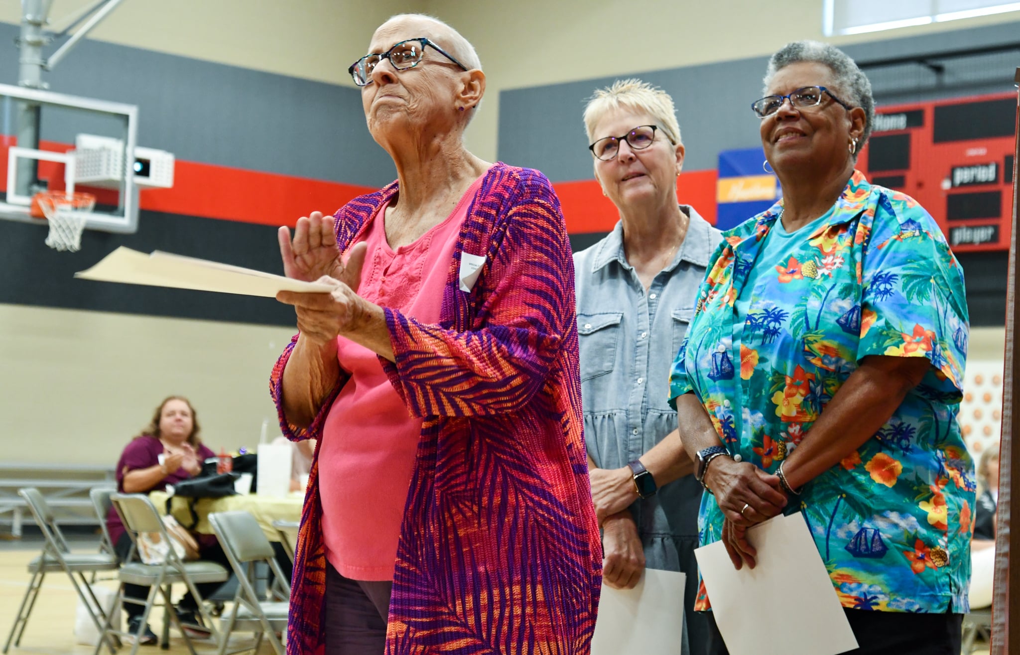Bea Webb, Genice Fisher and Linda May watch a video together at the first-ever Coaches Celebration Event on Saturday, July 16, 2022 at the Training for Life Campus in Jefferson City, Mo.