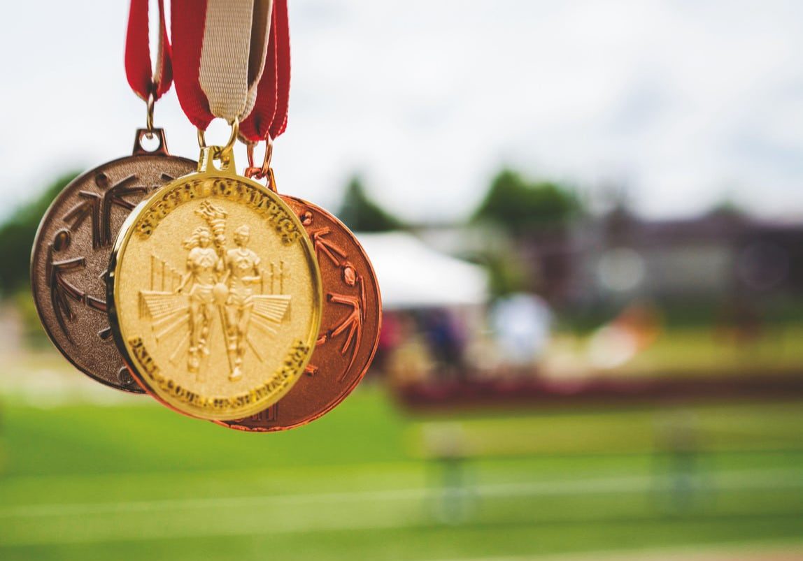 Color photo of three hanging medals